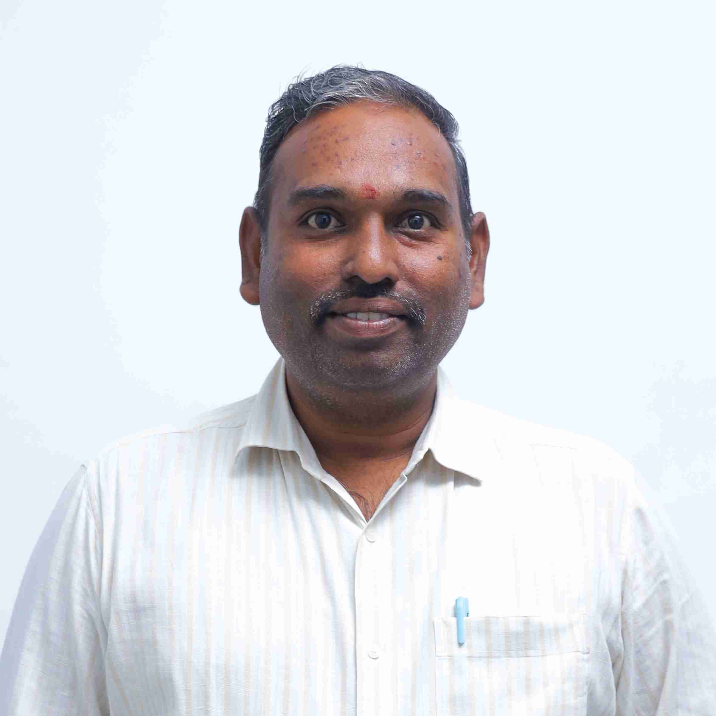 Dr.DHARMARAJ R