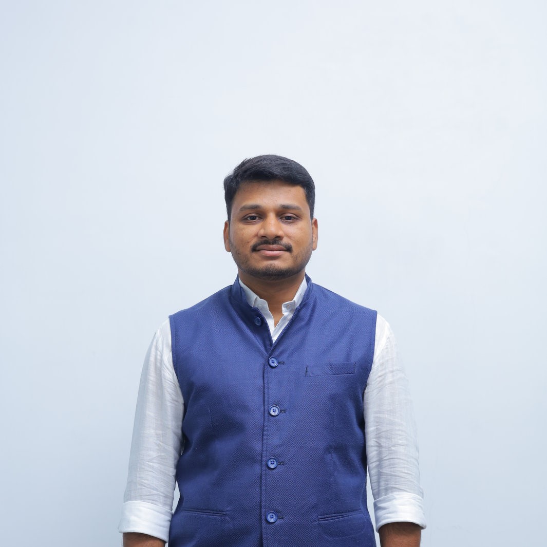 Dr. DINESH C